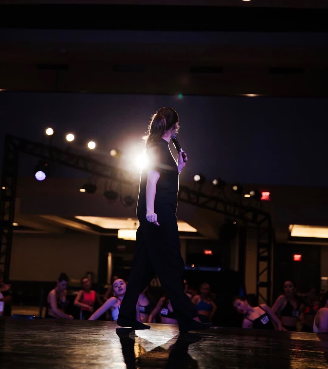 Megan teaching on a convention stage